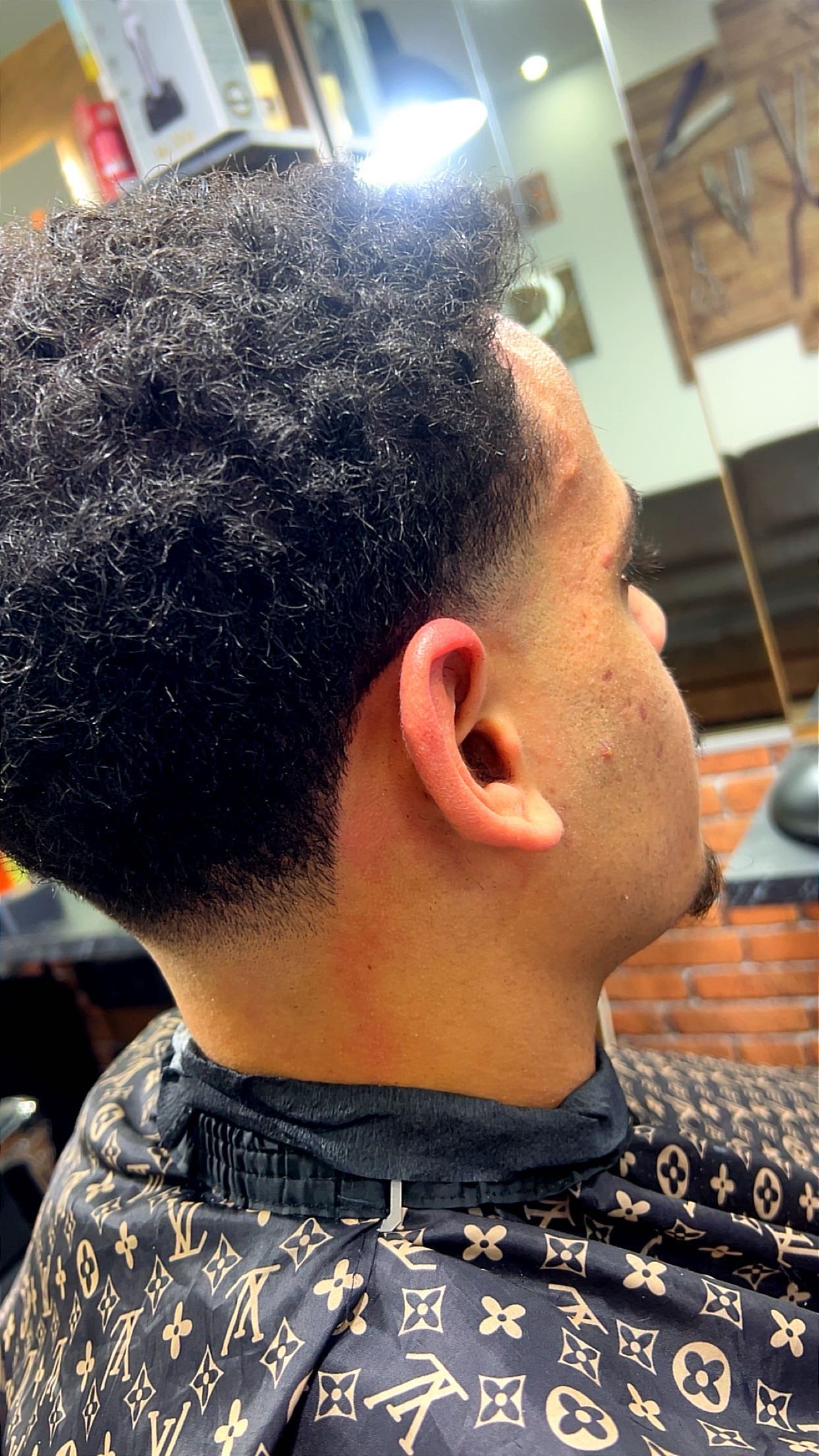 Réalisation coupe et style au salon Haircut Lille 4
