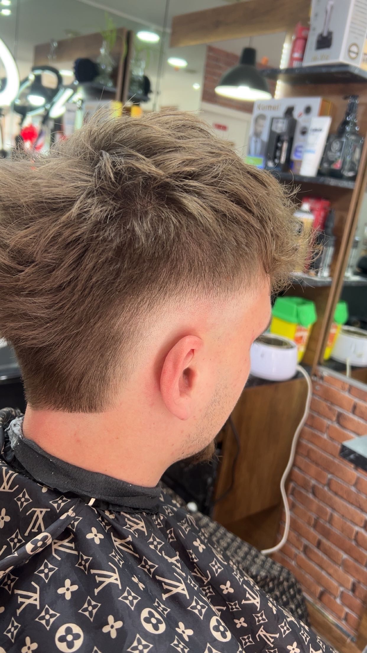Réalisation coupe et style au salon Haircut Lille 5