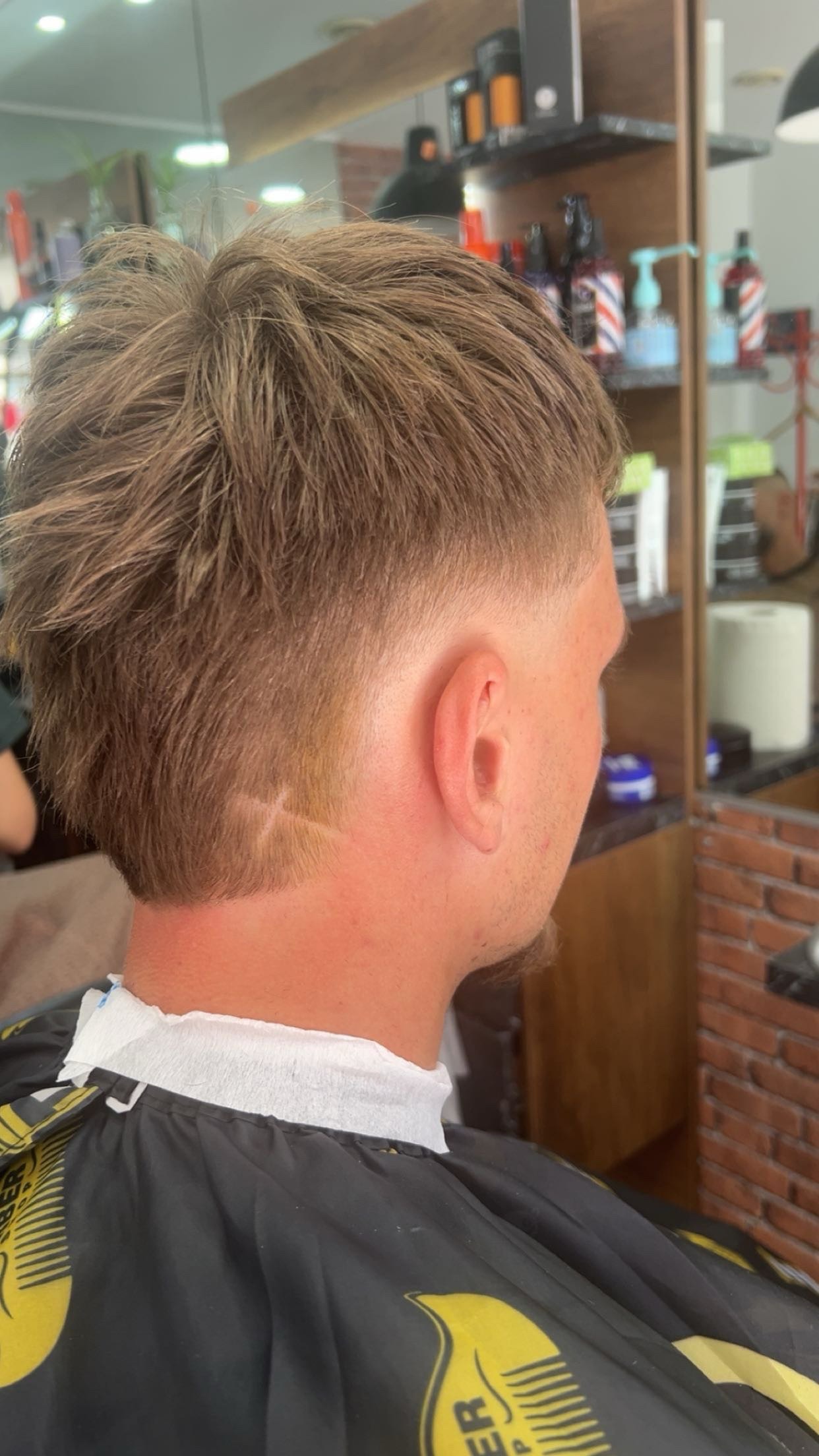 Réalisation coupe et style au salon Haircut Lille 10